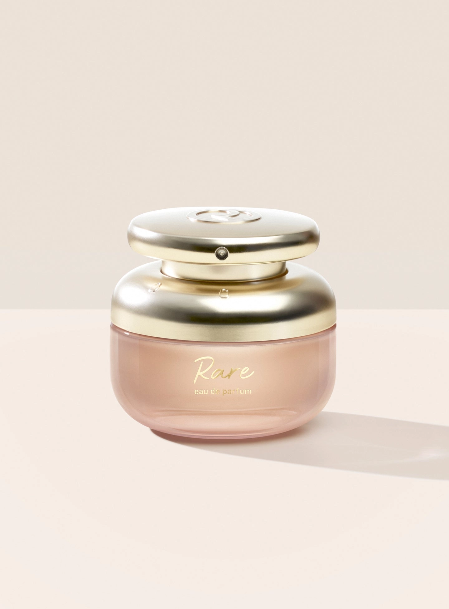 Rare Eau de Parfum, 50 mL, in a rounded bottle with a gold cap with script writing