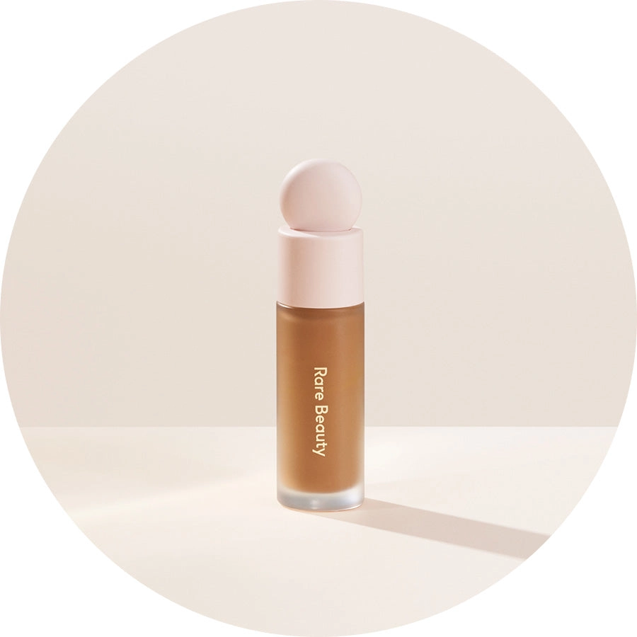 Liquid Touch Brightening Concealer being held in one hand